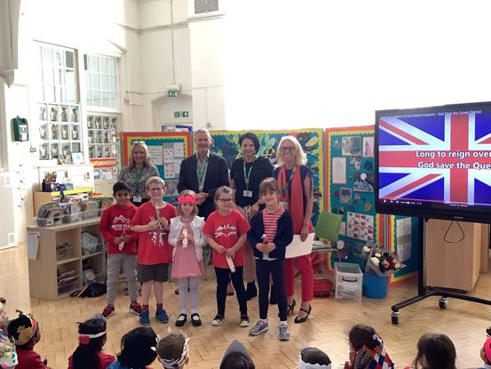 Students from Norwood Primary School receiving prize from Cllr Paul Bicknell